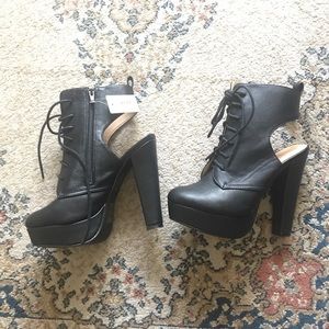 Black cut out boots